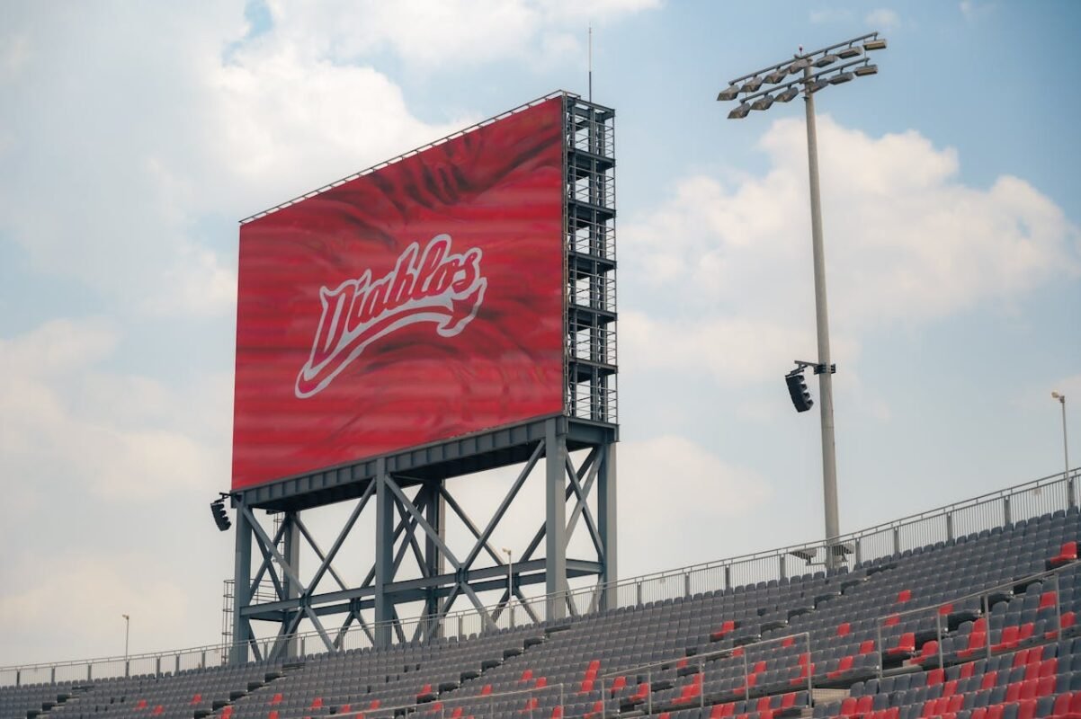 A large screen with the word university on it